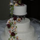 Wedding Cake with burgundy roses and pearl embossing