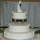 Elegant wedding cake with swags and rosettes